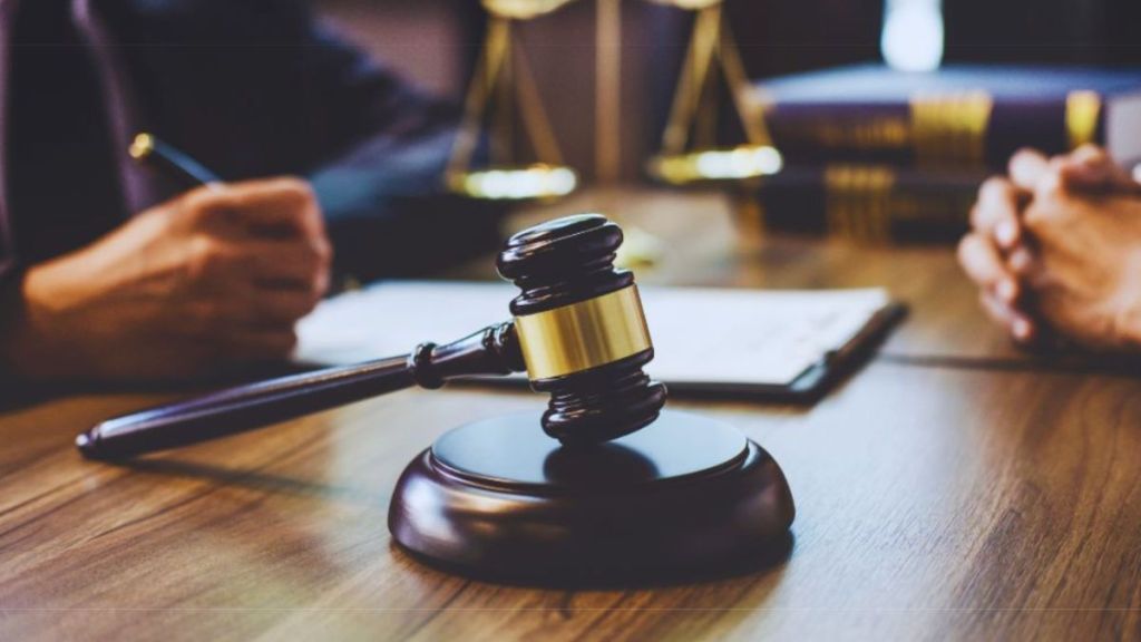 Violent Crimes Attorney Fort Lauderdale, Fl: Defense Options After An Arrest 3 Judge’s gavel on a desk during a legal consultation between a violent crime defense attorney and client in Fort Lauderdale.